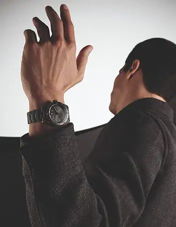 5. Men's watches 354 x 456 Man wearing a black Tudor watch on his wrist - Washington Watches