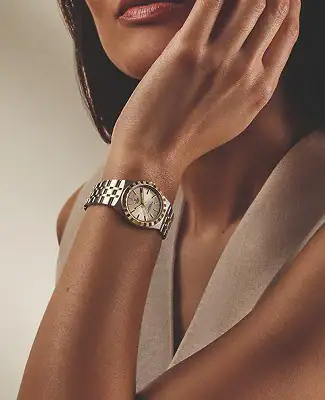 6. Women's watches 354 x 456 Woman wearing a Tudor watch with a silver bracelet - Washington Watches